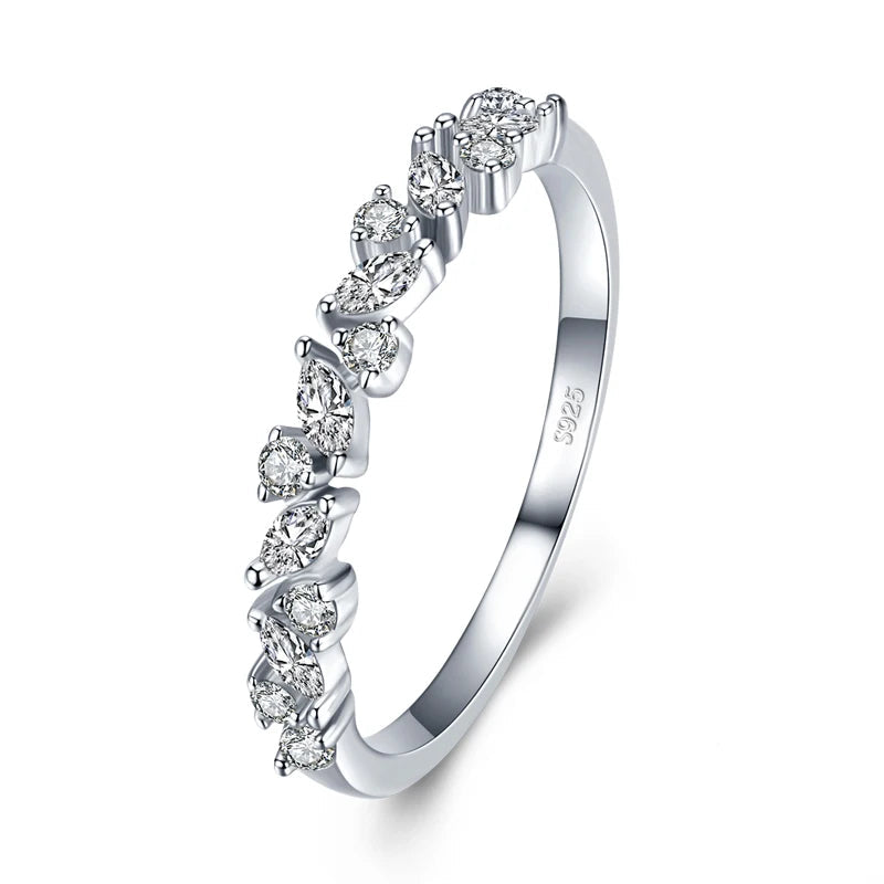 silver ring with diamonds on white backround